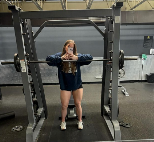 how much does a smith machine bar weigh